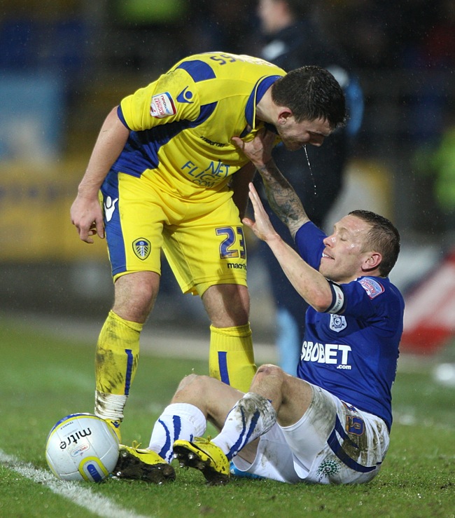 Leeds United's Robert Snodgrass appeared to spit at Cardiff City's Craig