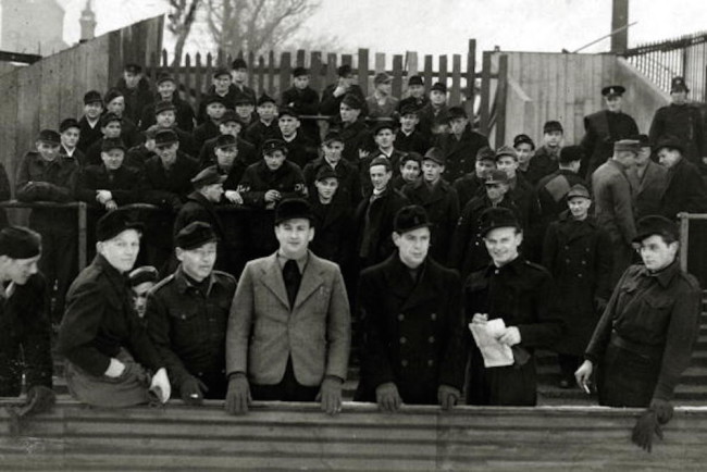 War and Conflict, Post World War Two, pic: circa 1946, London, German prisoners enjoying a day out at Upton Park to watch West Ham United play Bradford, the men allowed out because of their good behaviour  (Photo by Popperfoto/Getty Images)