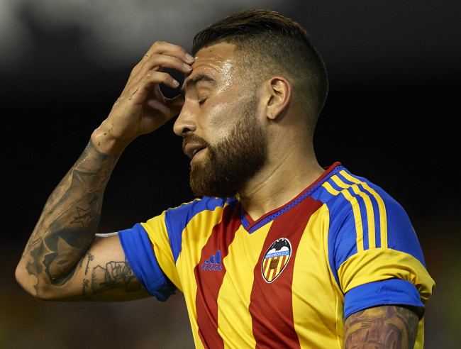 VALENCIA, SPAIN - AUGUST 08: Nicolas Otamendi of Valencia reacts as he fails to score during the pre-season friendly match between Valencia CF and AS Roma at Estadio Mestalla on August 8, 2015 in Valencia, Spain. (Photo by Manuel Queimadelos Alonso/Getty Images)