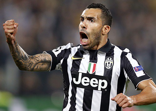 Carlos Tevez gave Juventus a 2-1 win in the Champions League semi-final first leg with Real Madrid