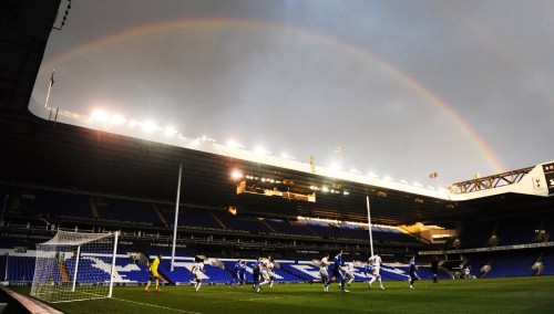 A rainbow forms a colourful corona above the East Stand at White Hart Lane